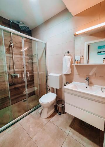 Ванная комната в Astoria Apartments