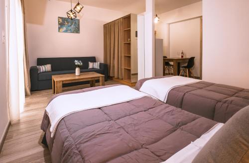 Postel nebo postele na pokoji v ubytování Sophies Greek Gateway