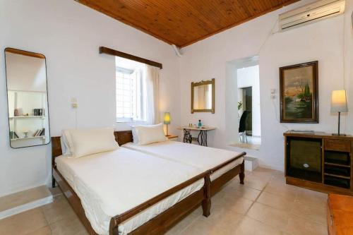 Postel nebo postele na pokoji v ubytování Chrysa s house