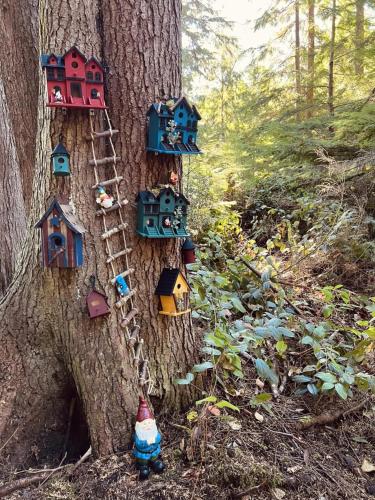 a group of houses on a tree at Perch - Ellie's Secret Cabin in Coupeville