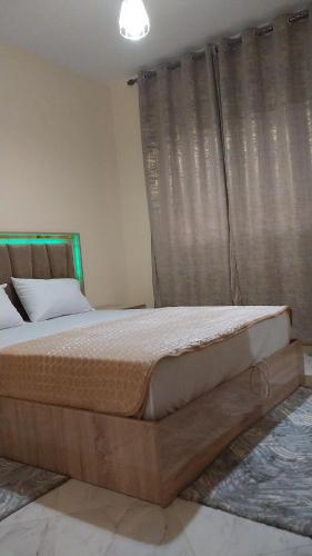 Ένα ή περισσότερα κρεβάτια σε δωμάτιο στο طنجة العوامة