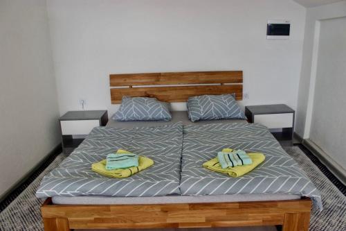 Una cama o camas en una habitación de Vista Sarajevo Old Town