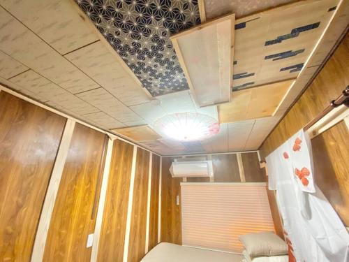 Una cama o camas en una habitación de 名古屋駅徒歩15分 沙羅居Suite Japanesque 貸切戸建110平米最大12名無料駐車場付
