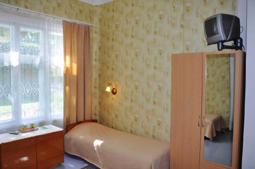 Postel nebo postele na pokoji v ubytování Tiia Guesthouse