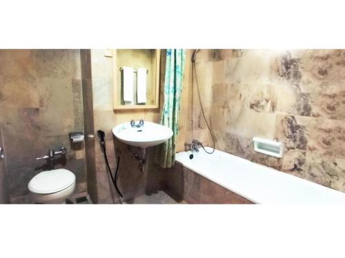 Koupelna v ubytování Merpati Hotel
