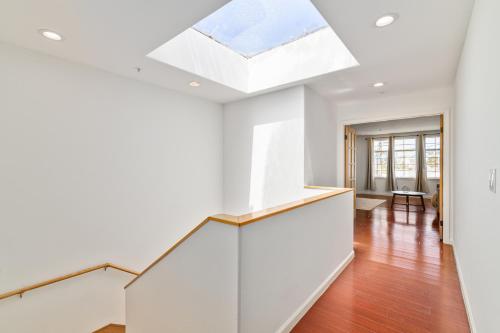 a house with a skylight in the ceiling at # Marbella Lane - Vibrant 5BR Home in Daly City in Daly City