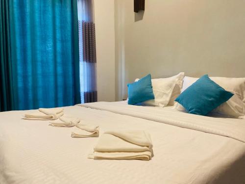 Postel nebo postele na pokoji v ubytování Beach Escape