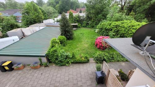 an aerial view of a patio with plants and flowers at Wohnung in Datteln in Datteln