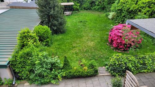 an aerial view of a garden with flowers and bushes at Wohnung in Datteln in Datteln