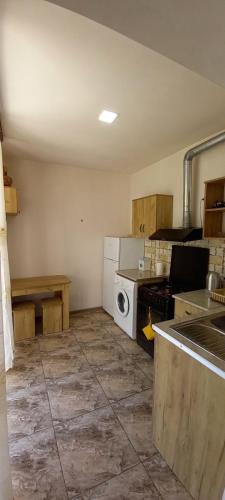 a kitchen with a stove and a stove top oven at Apartment in Alaverdi in Alaverdi