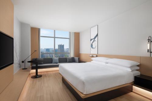 Ένα ή περισσότερα κρεβάτια σε δωμάτιο στο Fairfield by Marriott Hangzhou Wulin Square, China