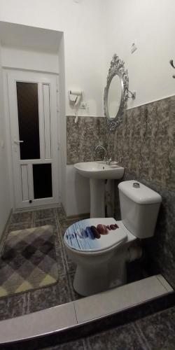 a bathroom with a toilet and a sink at Apartment in Alaverdi in Alaverdi