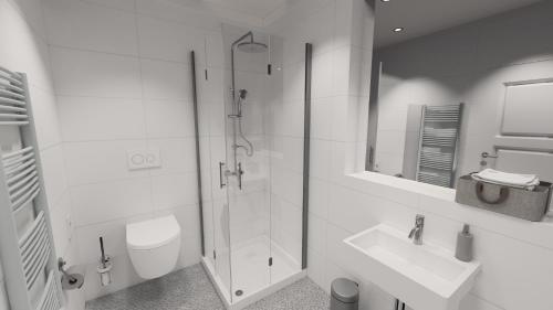 a white bathroom with a shower and a sink at Hotel Kredell in Neckargemünd