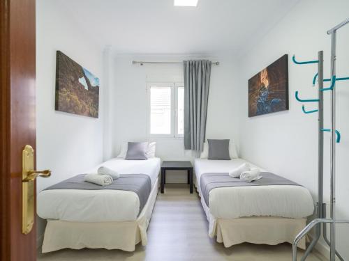 Postel nebo postele na pokoji v ubytování Penthouse Terrace city-sea view by CanariasGeytaway