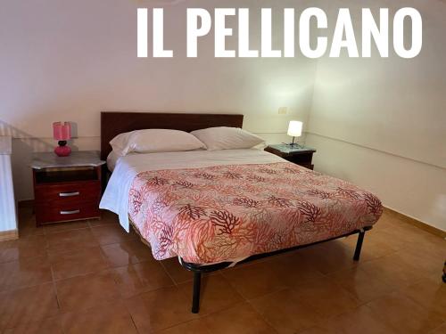 Postel nebo postele na pokoji v ubytování Ponzamania La terrazza di Cala Feola