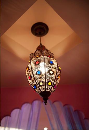 a chandelier is hanging from a ceiling at Rowan House in Taichung