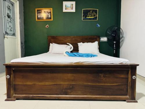 Postel nebo postele na pokoji v ubytování Tiny Homestay