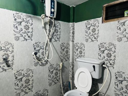Koupelna v ubytování Tiny Homestay