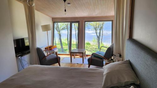 Postel nebo postele na pokoji v ubytování Guest House Vidlauči