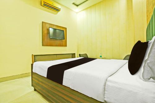 Katil atau katil-katil dalam bilik di OYO Hotel Poras