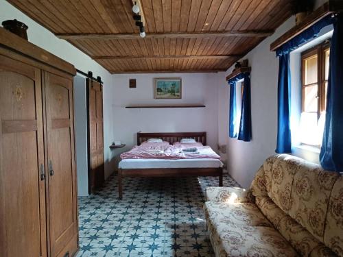 Posteľ alebo postele v izbe v ubytovaní Apartmány Pod jilmem