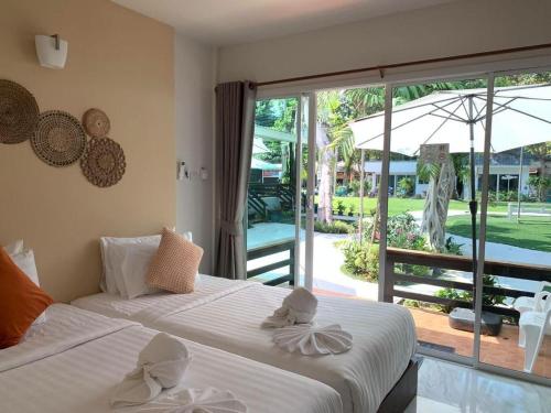 Postel nebo postele na pokoji v ubytování Samet Lucky Resort