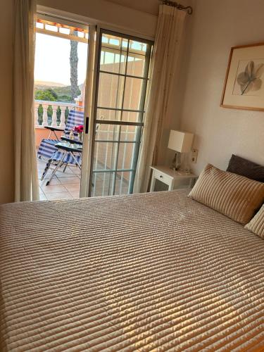 Katil atau katil-katil dalam bilik di Gran Alacant Relax Casa