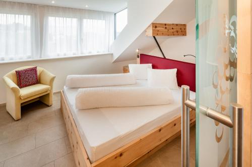 Ένα ή περισσότερα κρεβάτια σε δωμάτιο στο Residence Preyhof