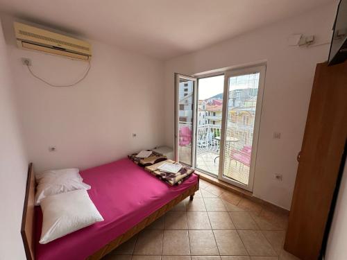 Postelja oz. postelje v sobi nastanitve Apartmani Vukcevic