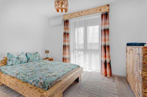 Ένα ή περισσότερα κρεβάτια σε δωμάτιο στο Apartament Felix - Ariana 308