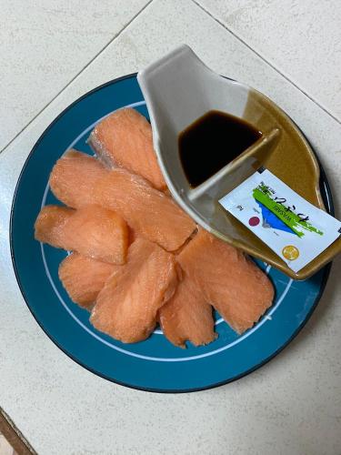 a blue plate of food with a bowl of food at Rainbow Bungalow Haadrin Koh Phangan in Haad Rin