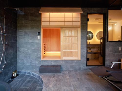 Koupelna v ubytování KONJAKUSO Nara Naramachi "MUSHIBUROYA" Sauna Villa