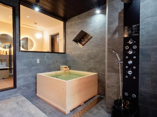 Koupelna v ubytování KONJAKUSO Nara Naramachi "MUSHIBUROYA" Sauna Villa