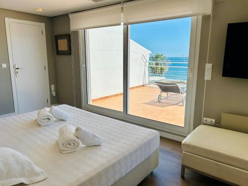 Katil atau katil-katil dalam bilik di Javea Ocean View II