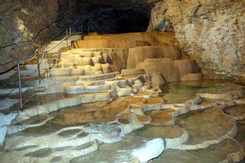 a set of stairs in a cave at Chez Odette et Ricardo Meximieux - Pérouges in Meximieux