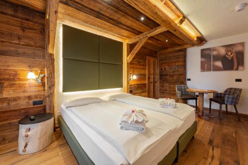 Fotografie z fotogalerie ubytování Hotel Arnika Wellness v destinaci Passo San Pellegrino
