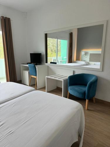Osprey Menorca Hotelにあるベッド