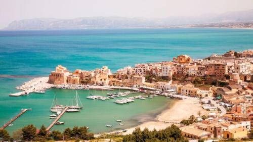 an aerial view of a harbor with boats in the water at Casa Fugardi in Castellammare del Golfo