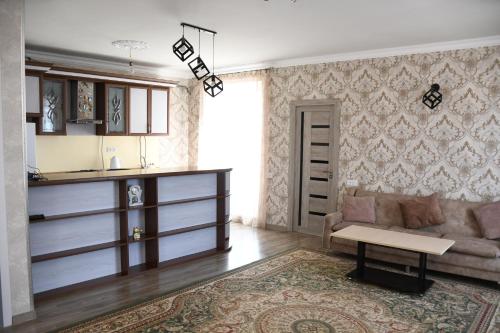Posezení v ubytování Armani Guest house