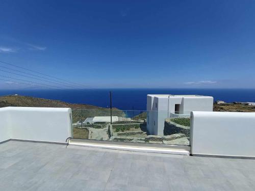 a view of the ocean from the roof of a building at Seascape, apartment 1 with sea view in Ano Meria