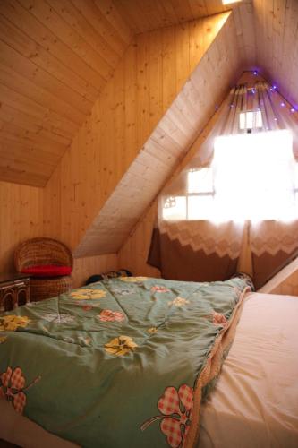 Ένα ή περισσότερα κρεβάτια σε δωμάτιο στο Cozy Nest Homestay