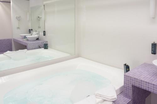 Koupelna v ubytování Ariha Hotel Cosenza