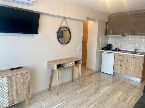 Kuchyň nebo kuchyňský kout v ubytování THOMAS STUDIOS & APARTMENTS PARALIA 2