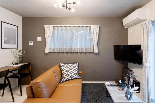 Μια τηλεόραση ή/και κέντρο ψυχαγωγίας στο Bijou Suites Cocoa