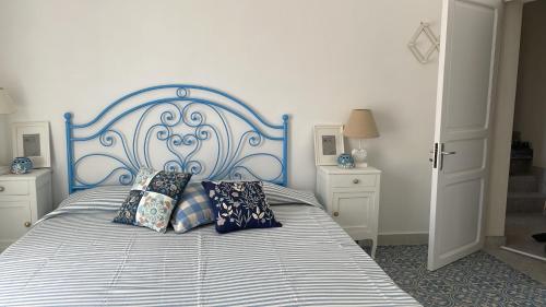 Ένα ή περισσότερα κρεβάτια σε δωμάτιο στο Casa Pagica