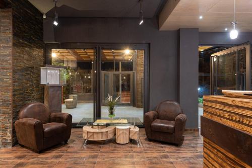 The lobby or reception area at Corten Hotel