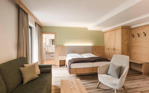 Postel nebo postele na pokoji v ubytování Hotel Karin