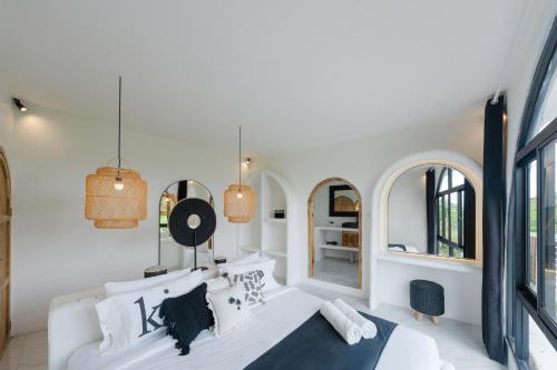 White Palm Hotel Uluwatu Baliにあるベッド