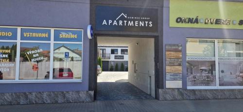 a group of windows on the side of a building at DomirexGroup Apartments in Lučenec