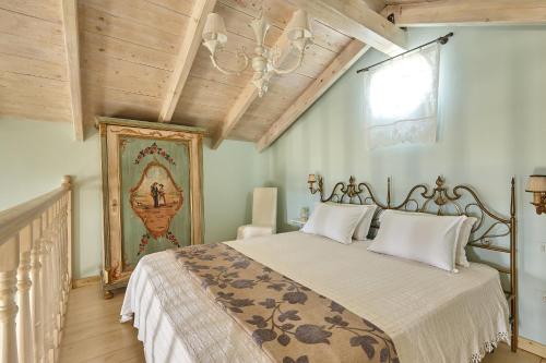 Posteľ alebo postele v izbe v ubytovaní Orelia Cretan Deluxe Apartments
